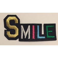 Tygmärke Smile